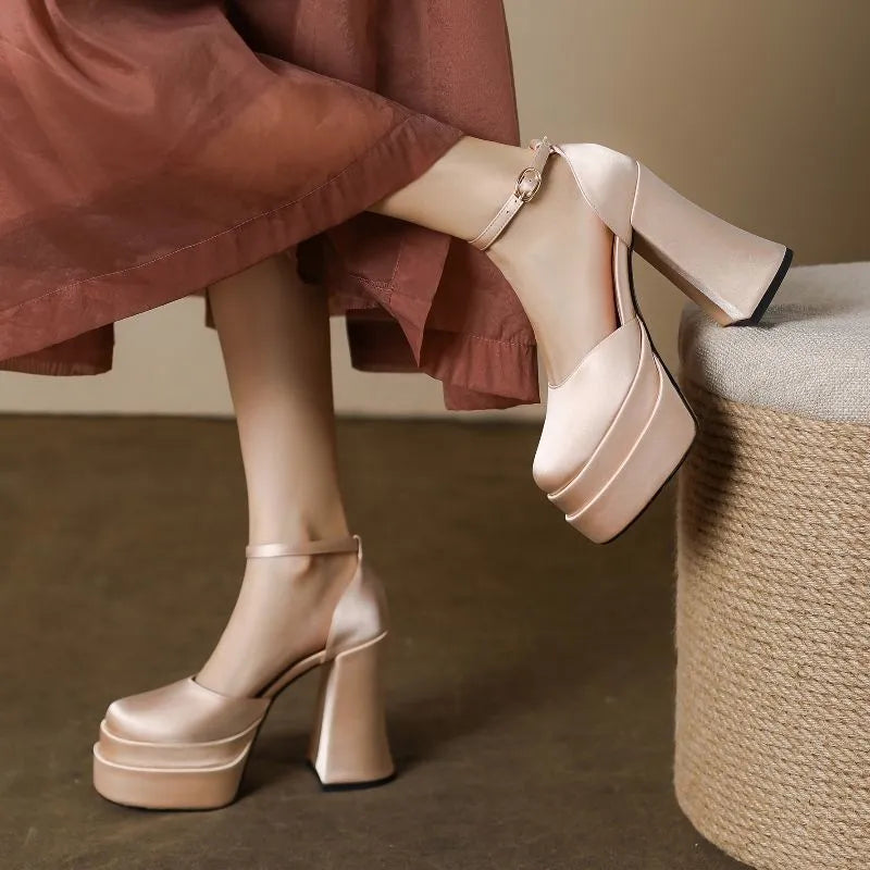 Women's white platform high heels with a chunky heel, round toe, and waterproof PU upper.