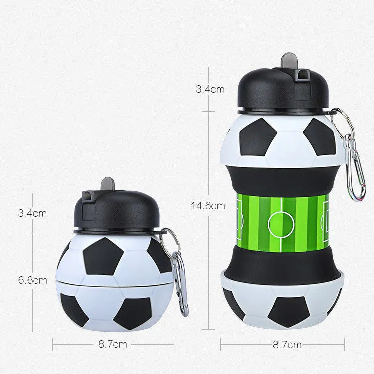 White collapsible soccer ball silicone water bottle with straw and black carrying clip on white background