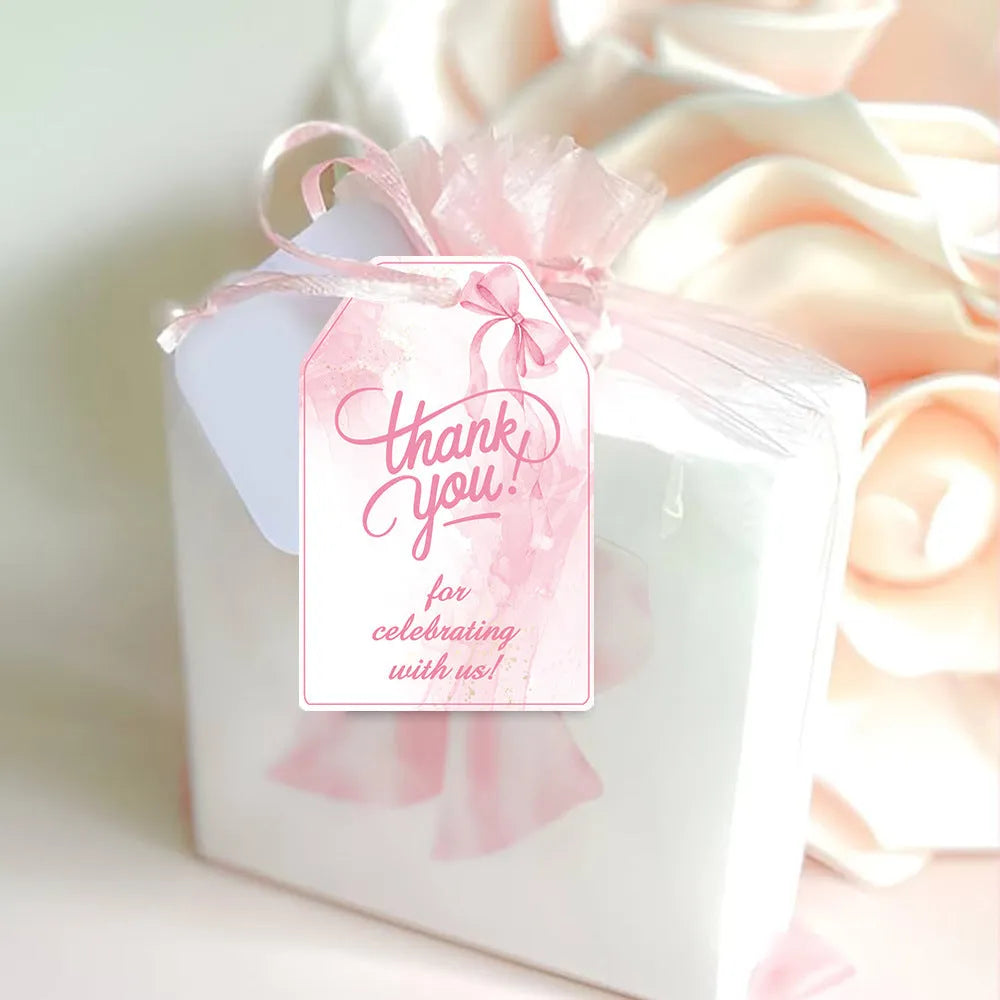 Three style variations of creative bowknot gift label tags with hemp rope attachments