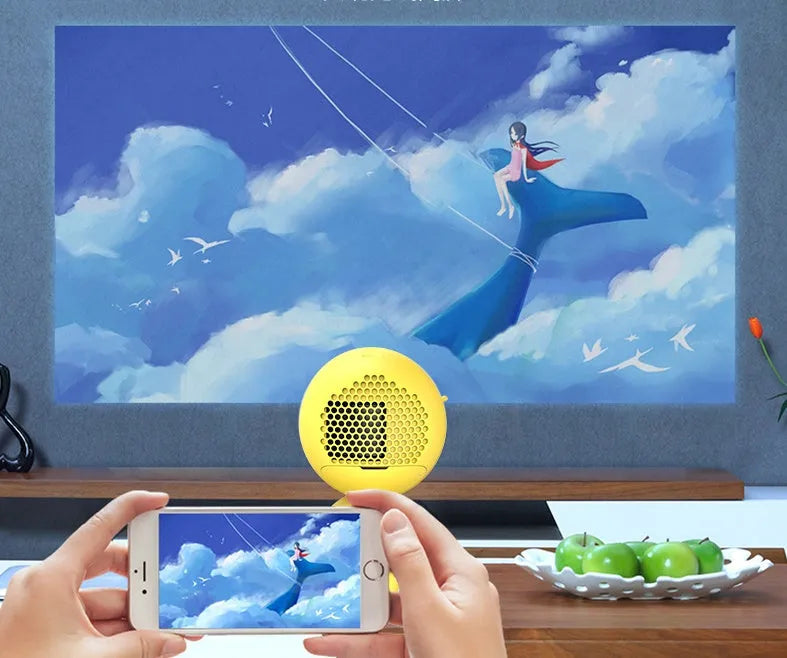 YG220 portable LED projector in white or yellow colour showing compact 0.7kg design with 1080P support