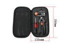 Black handheld grafting scissors with high carbon steel blade and ABS handle on a wooden surface