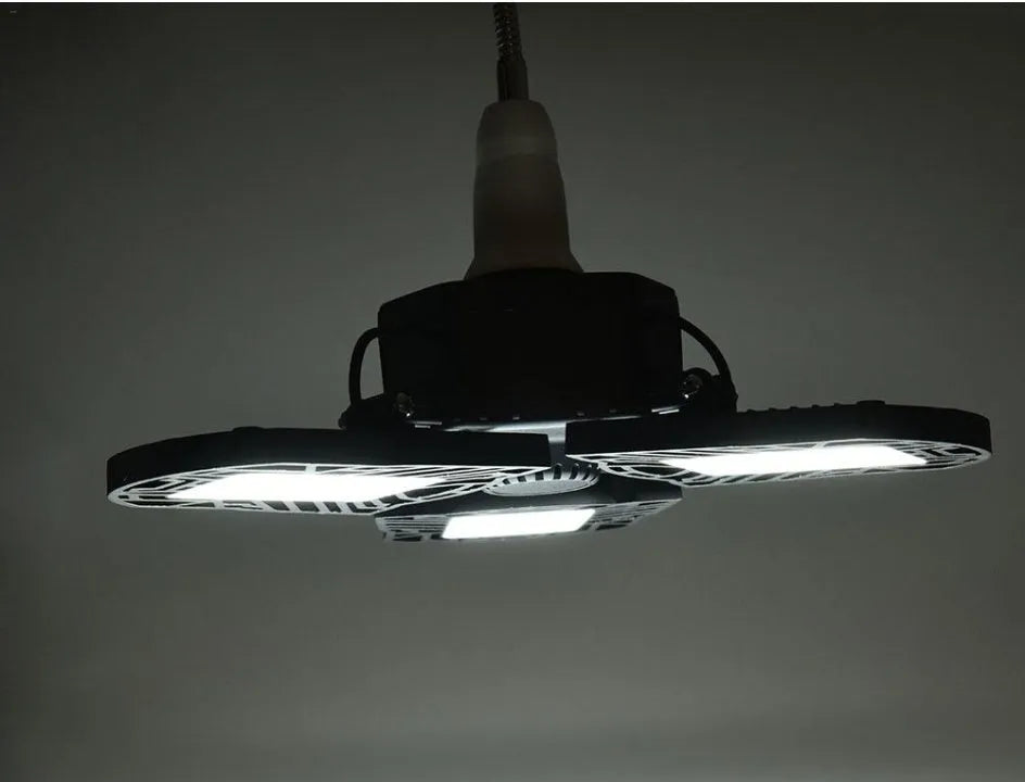 Silver 60W deformable LED garage light with adjustable heads, E27 base, and IP65 rating