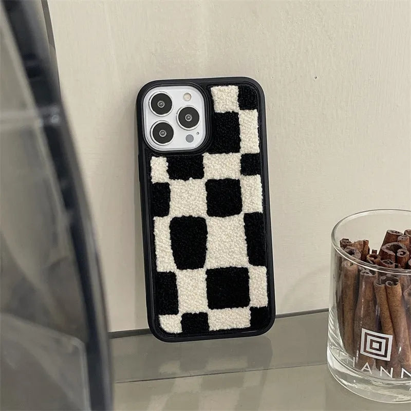 Black and white lattice silicone back cover for Apple iPhone models, including iPhone 14 and iPhone 13