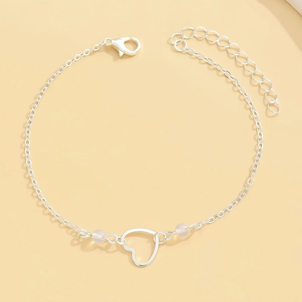 Adjustable gold or silver alloy anklet with heart-shaped pendant in simple geometric style