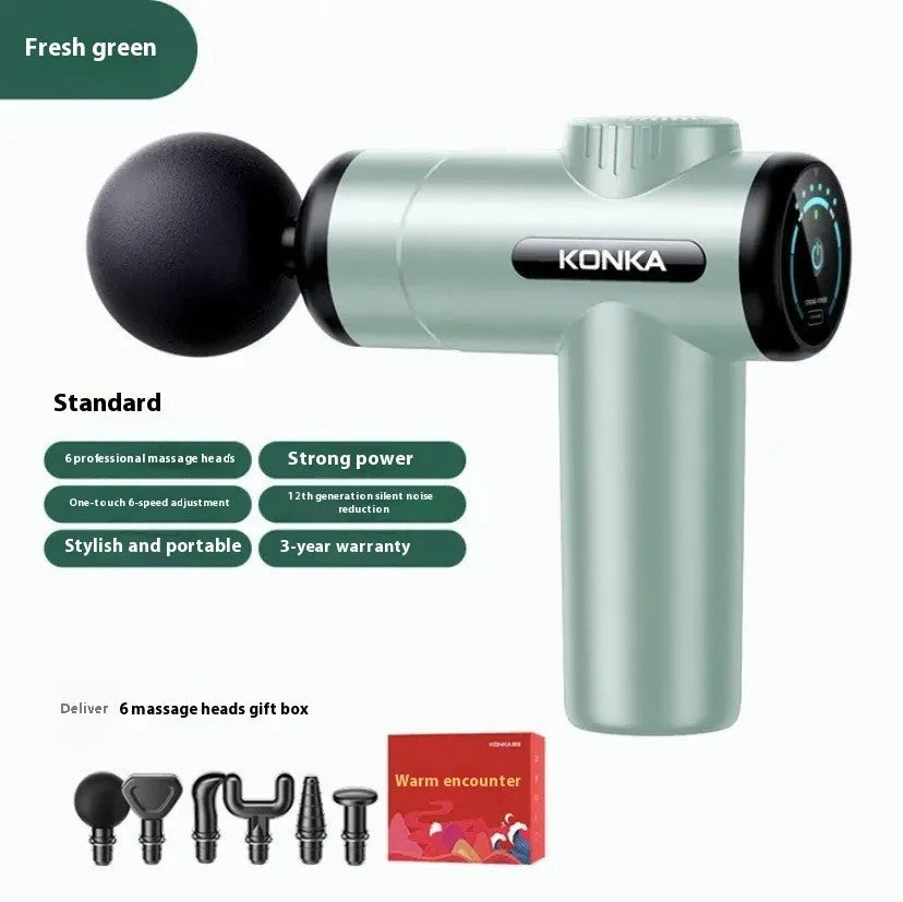 Konka professional electric mini massage gun in grey with multiple massage heads on a table