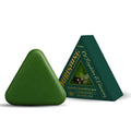 Triangle-shaped solid shampoo bar weighing 120g with herbal extracts