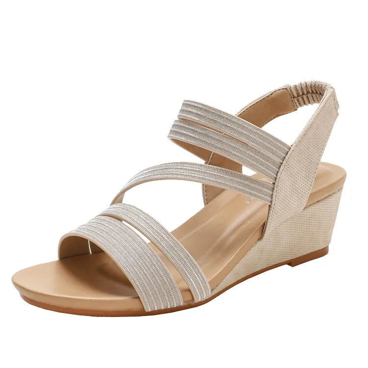 Women's platform sandals with soft leather bottom and middle heel in gold, grey, or pink