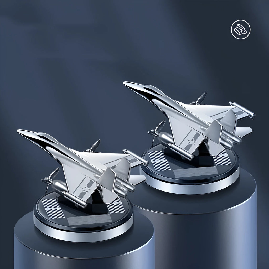 Solar powered rotating fighter jet perfume diffuser in silver with aluminium alloy seat and beech wood wick