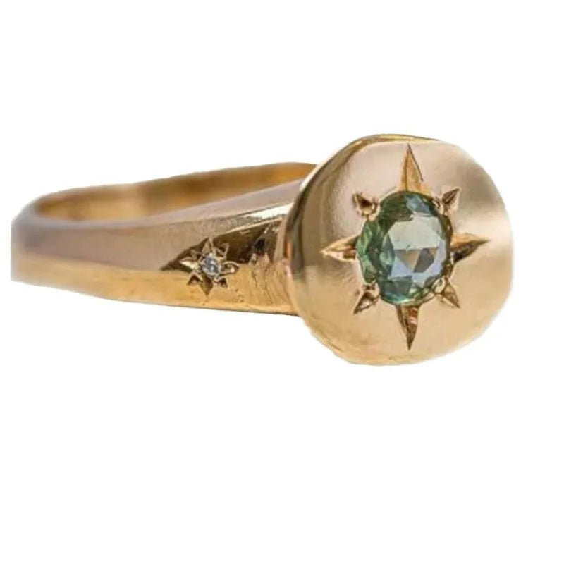 Golden oval asterism zircon ring with star design and adjustable opening