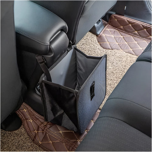 Black car folding trash can made from waterproof Oxford cloth, shown hanging