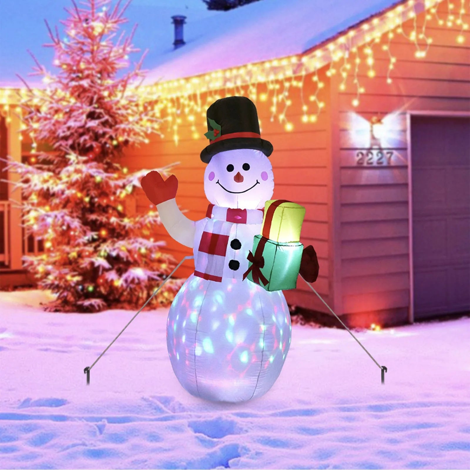 Glowing LED inflatable Christmas decoration showing Santa, tree, or snowman for outdoor garden use