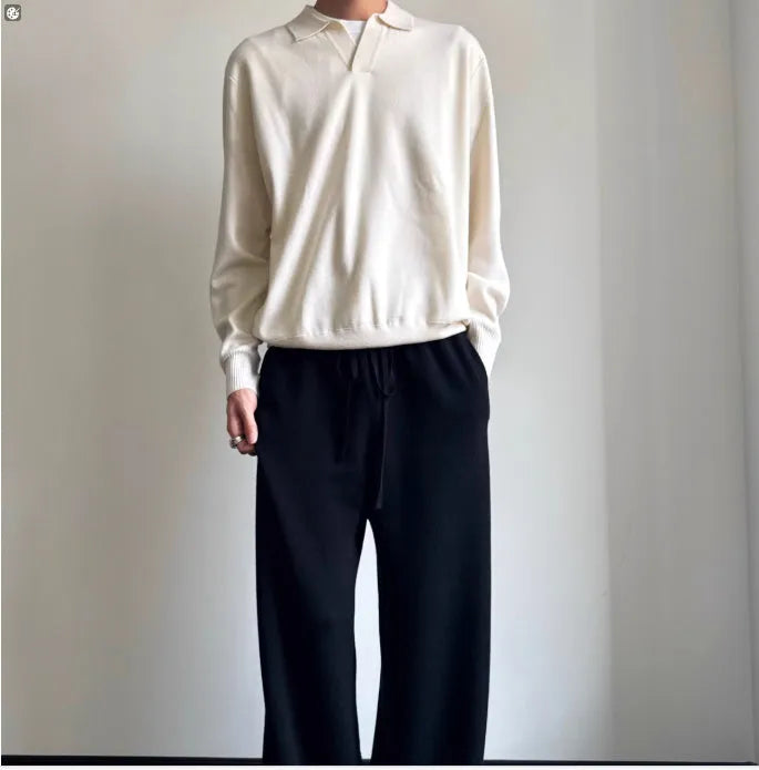 Man's milky white pure wool polo neck sweater with lapel collar and long sleeves.
