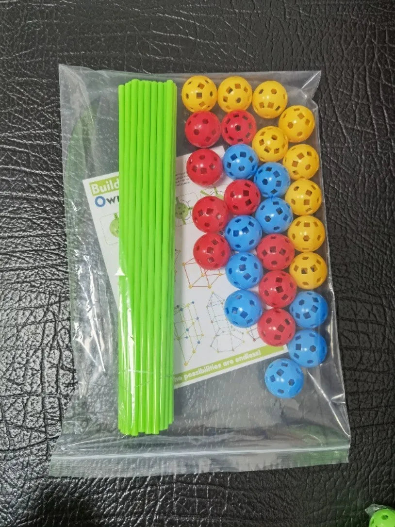 Luminous plastic fort building kit for kids with glowing sticks, balls, and fabric tent