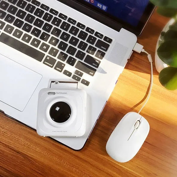 Paperang mini Bluetooth thermal printer in white, 83x83x45mm, with thermal paper roll