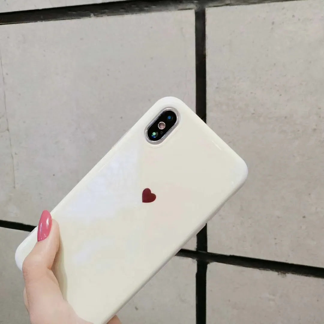 Clear transparent iPhone case with love heart design and blue light effect for iPhone models