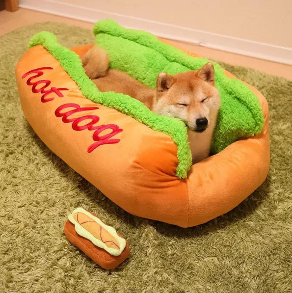 Hot dog shaped pet bed with flannelette mat, jean cloth sides, and anti-slip base for dogs and cats.