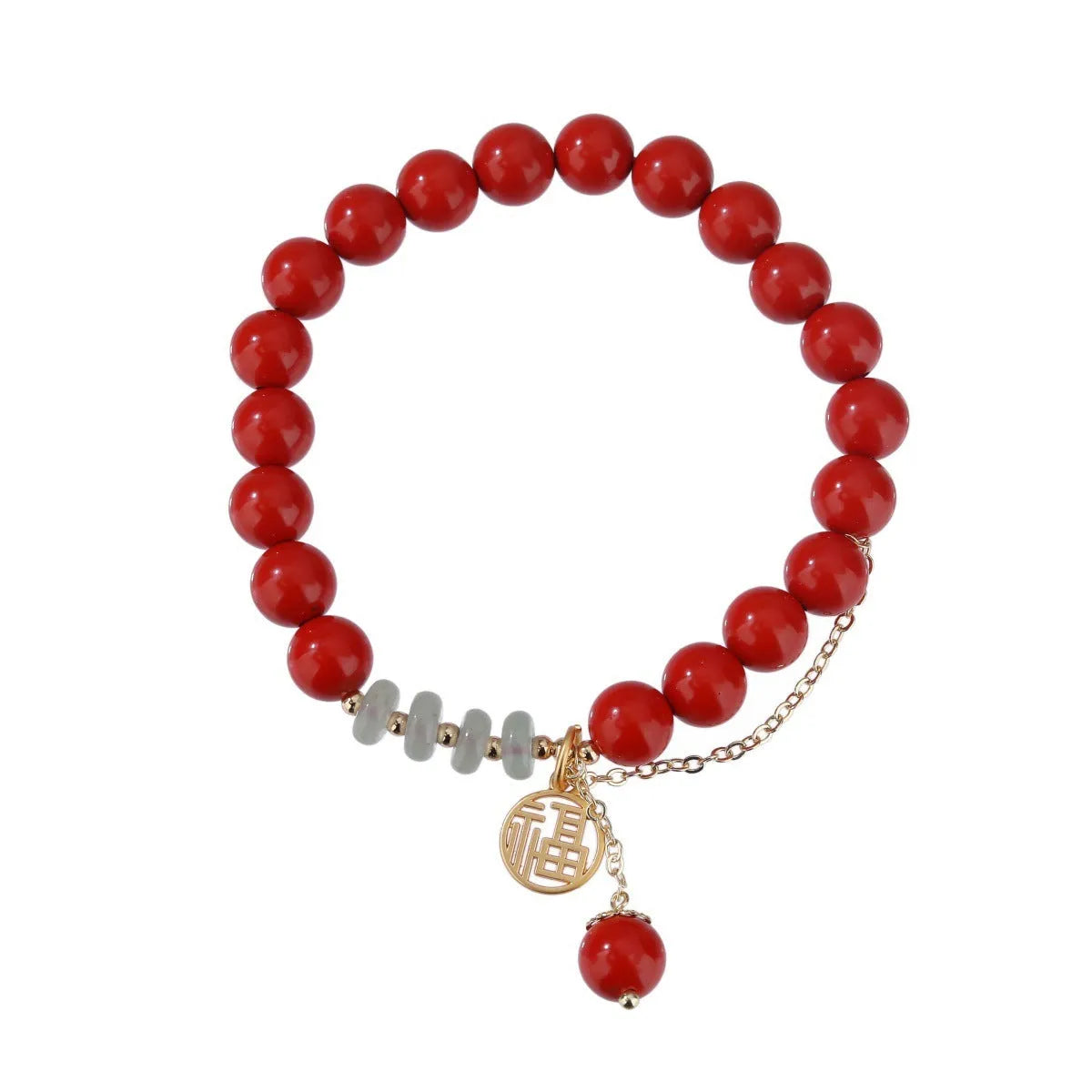 Close-up of a red cinnabar women's bracelet with a Fu character, jade spacer beads, and a small red tassel.