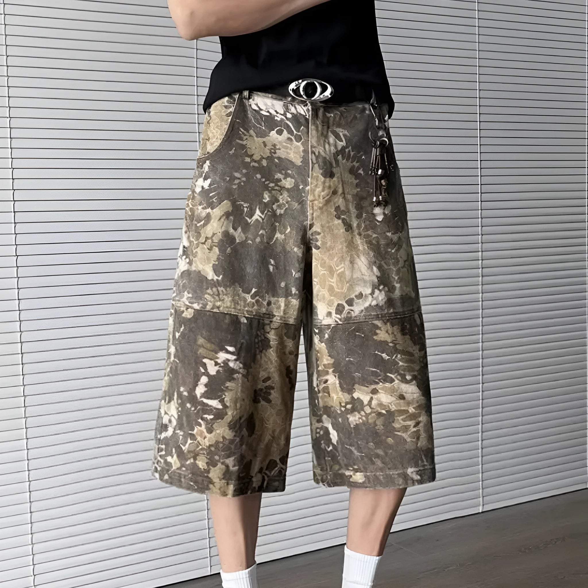 Yellow snake pattern camouflage cropped jeans in cotton denim.