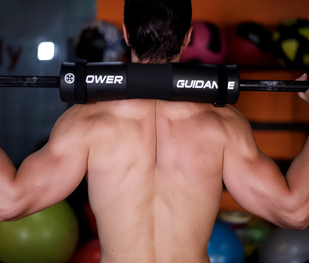Black foam barbell shoulder pad with curved design and 45x10 cm dimensions