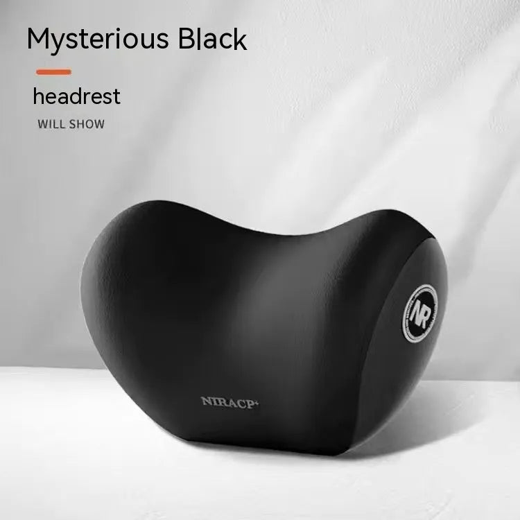 Black memory foam car lumbar support pillow and matching headrest pillow on a car seat.