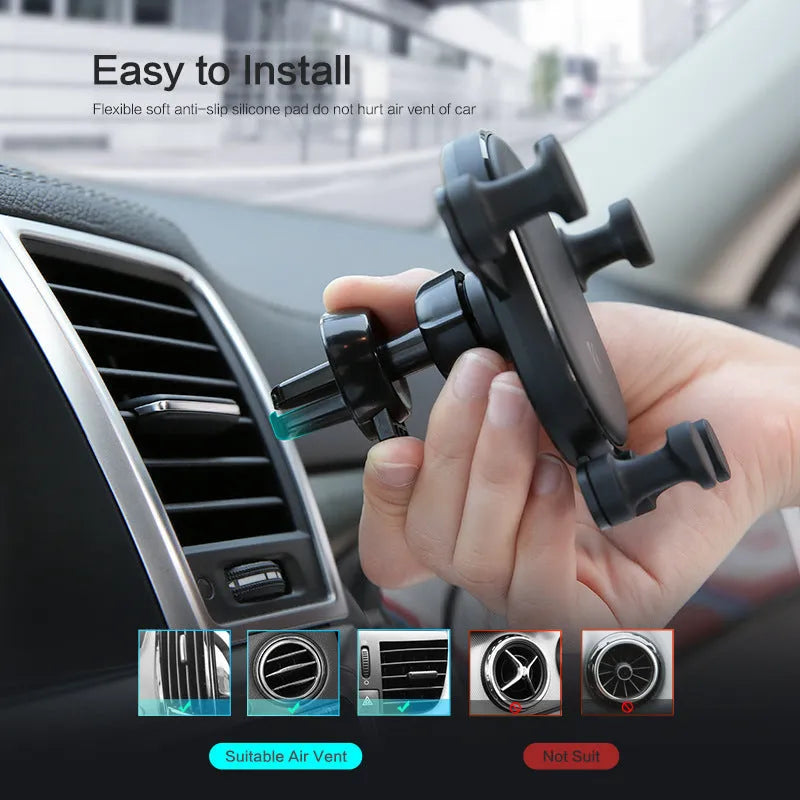 Black car phone holder with 360-degree rotation mounted on vehicle dashboard