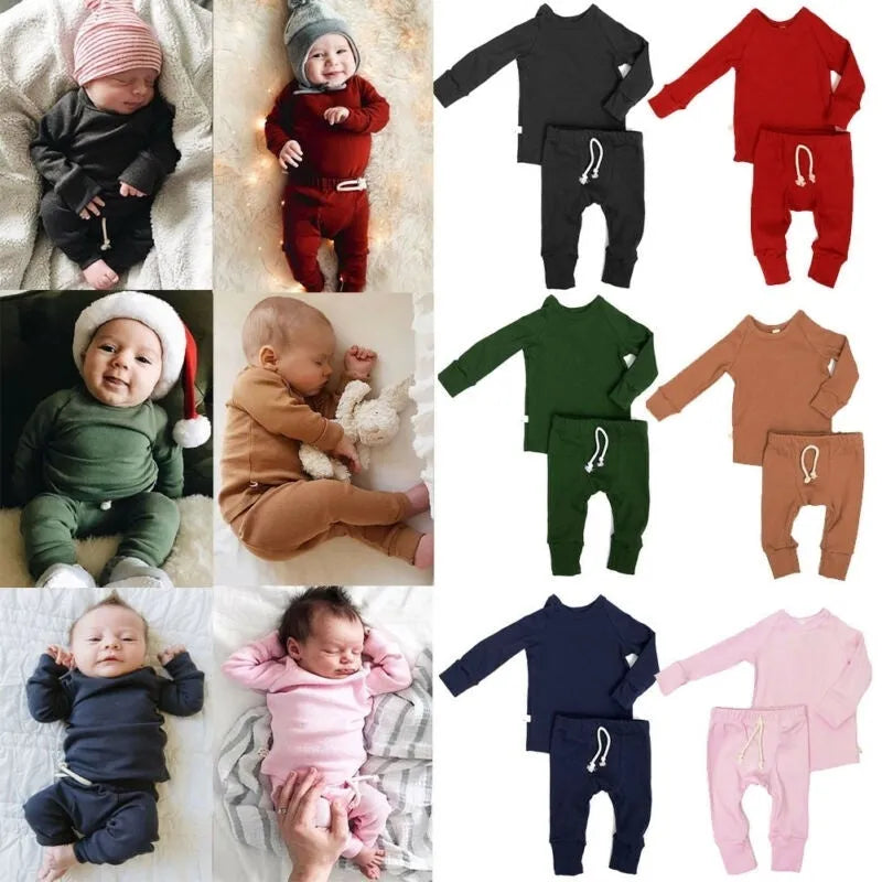 Blue cotton baby romper tracksuit set with cartoon pattern, showing top and pants.