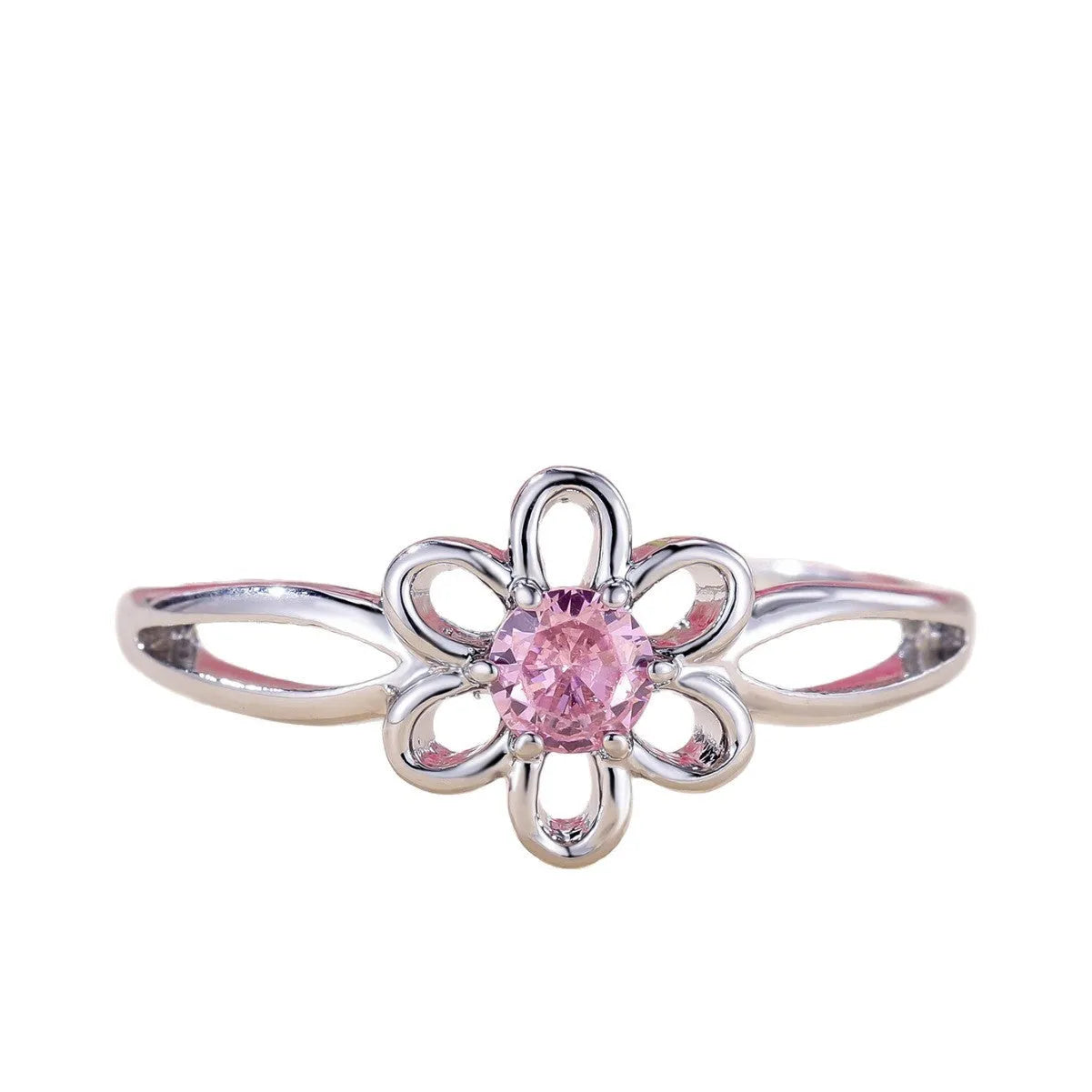 Women's hollowed flower fashion ring in electroplated platinum pink diamond colour on a white background.