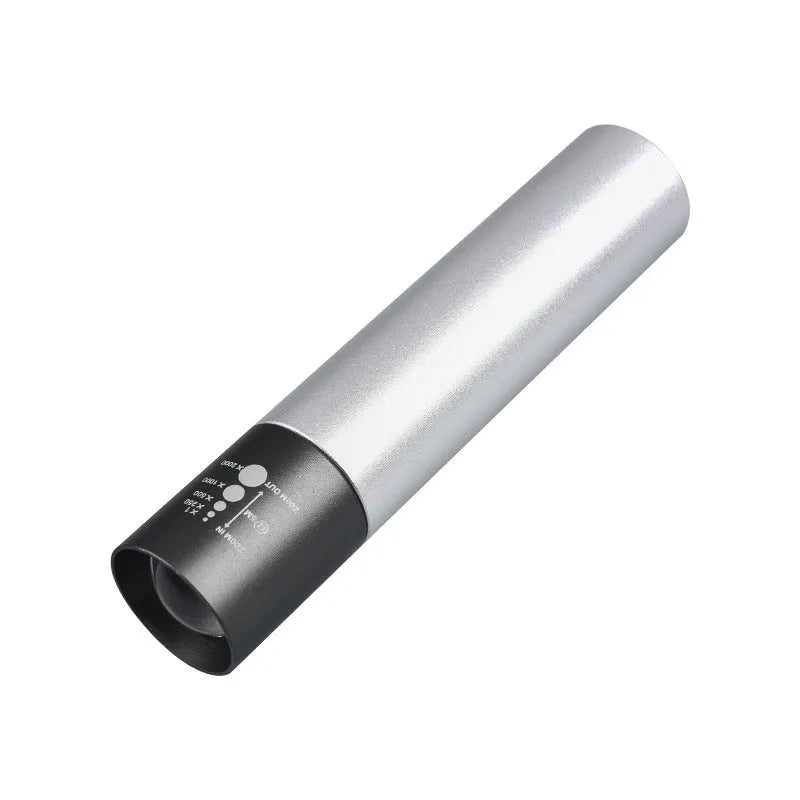 Handheld black aluminium red light mosquito repellent lamp with USB charging cable.