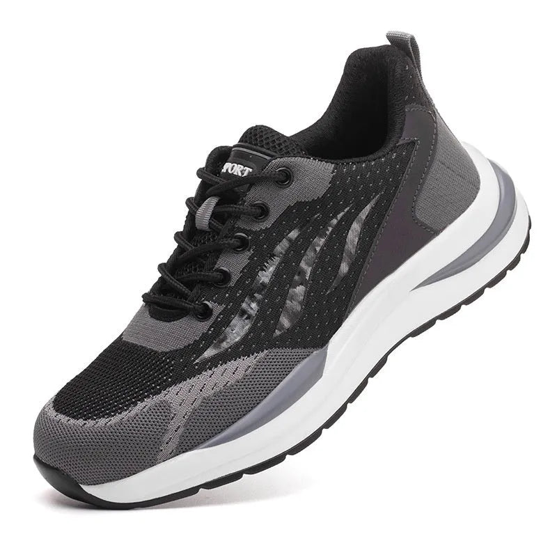 Men's black and grey low-top safety shoes with plastic toe cap, lace-up front, and textured PU sole.