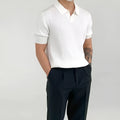Men's solid colour cotton blend polo shirt with half sleeves in loose fit