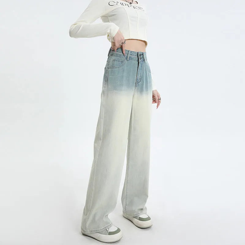 Women's gradient blue straight-leg denim trousers with wide leg style on hanger