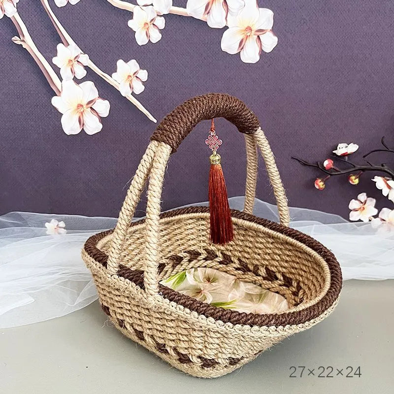Hand-woven hemp rope basket in natural brown colour measuring 19cm high by 12cm wide