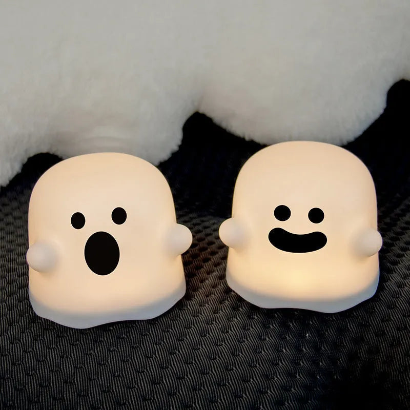 White silicone bedside night light with touch sensor base on wooden table