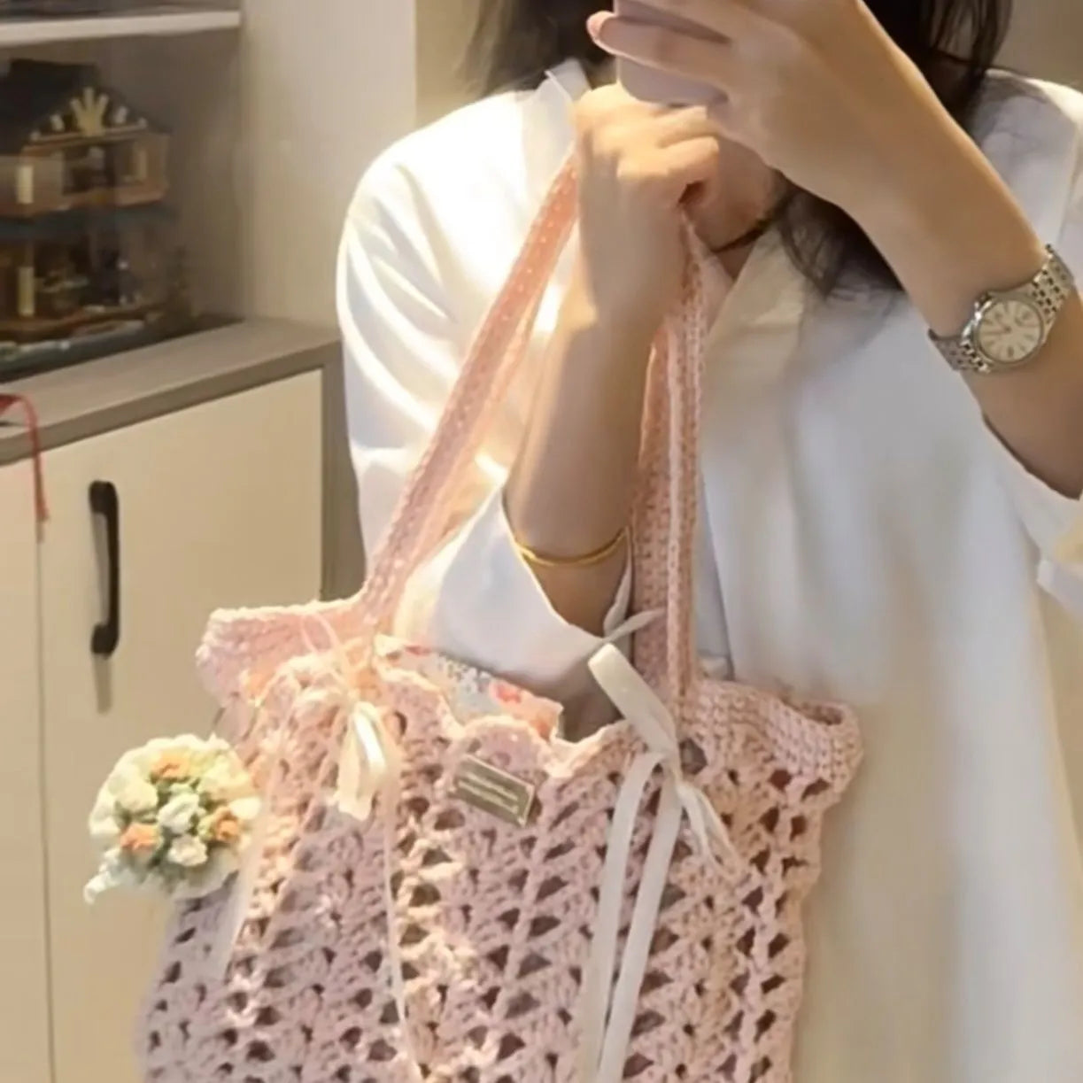 Hand-woven wool summer bag with floral pattern and secure closure