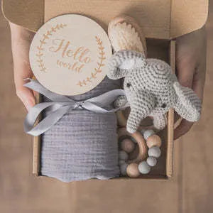 Baby teething toy gift set with bamboo cotton blanket and natural beech wood components