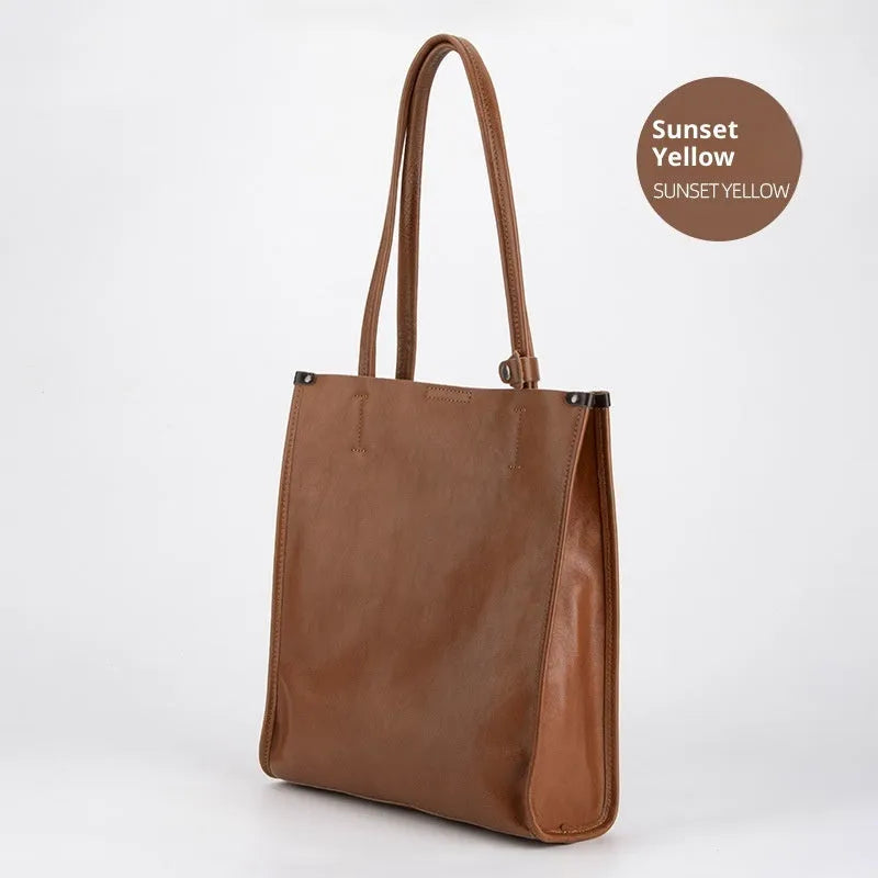 Large capacity genuine leather city commuter shoulder tote bag in black, soft square vertical shape with slit pocket