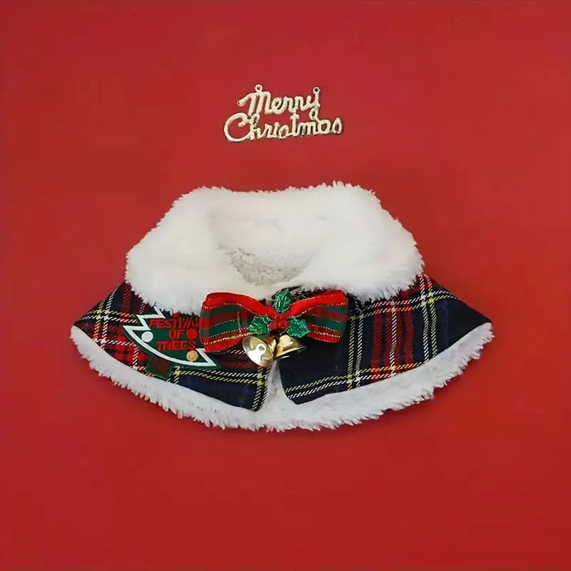 A red festive pet scarf with a bell pattern fastened around a dog's neck with an elastic collar.