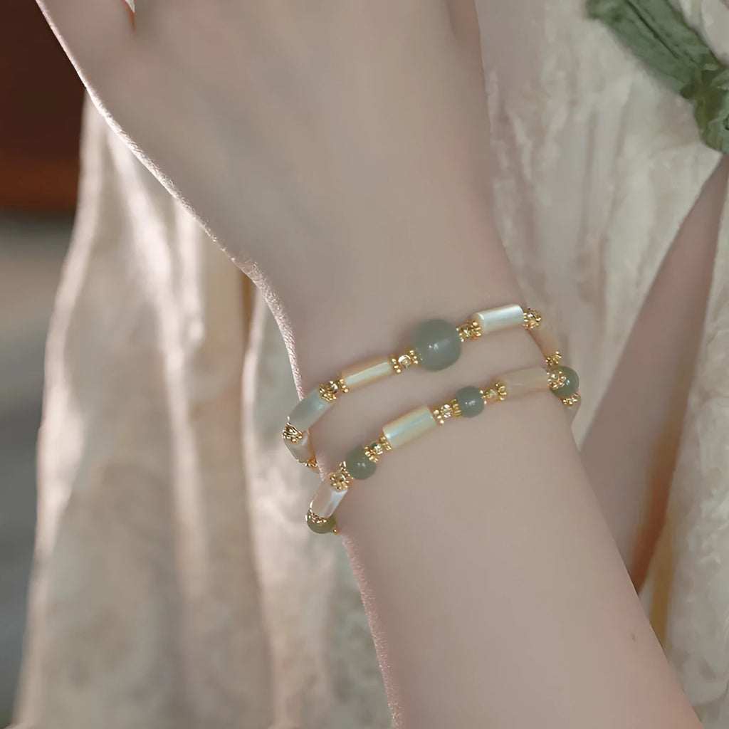 Women's Hetian jade bracelet with white round beads in simple geometric design