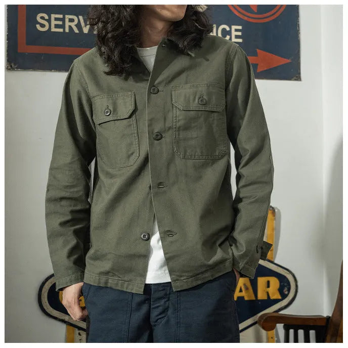 Olive green cotton satin men's work shirt with slim fit cardigan style on a white background