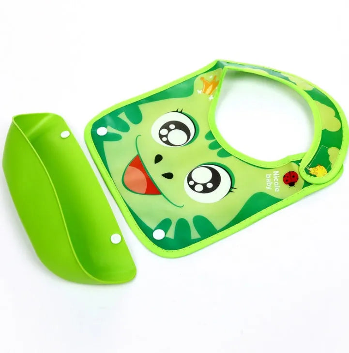 Cartoon baby PVC three-dimensional bib with blue koala pattern, silicone pocket and cotton cloth section on white background