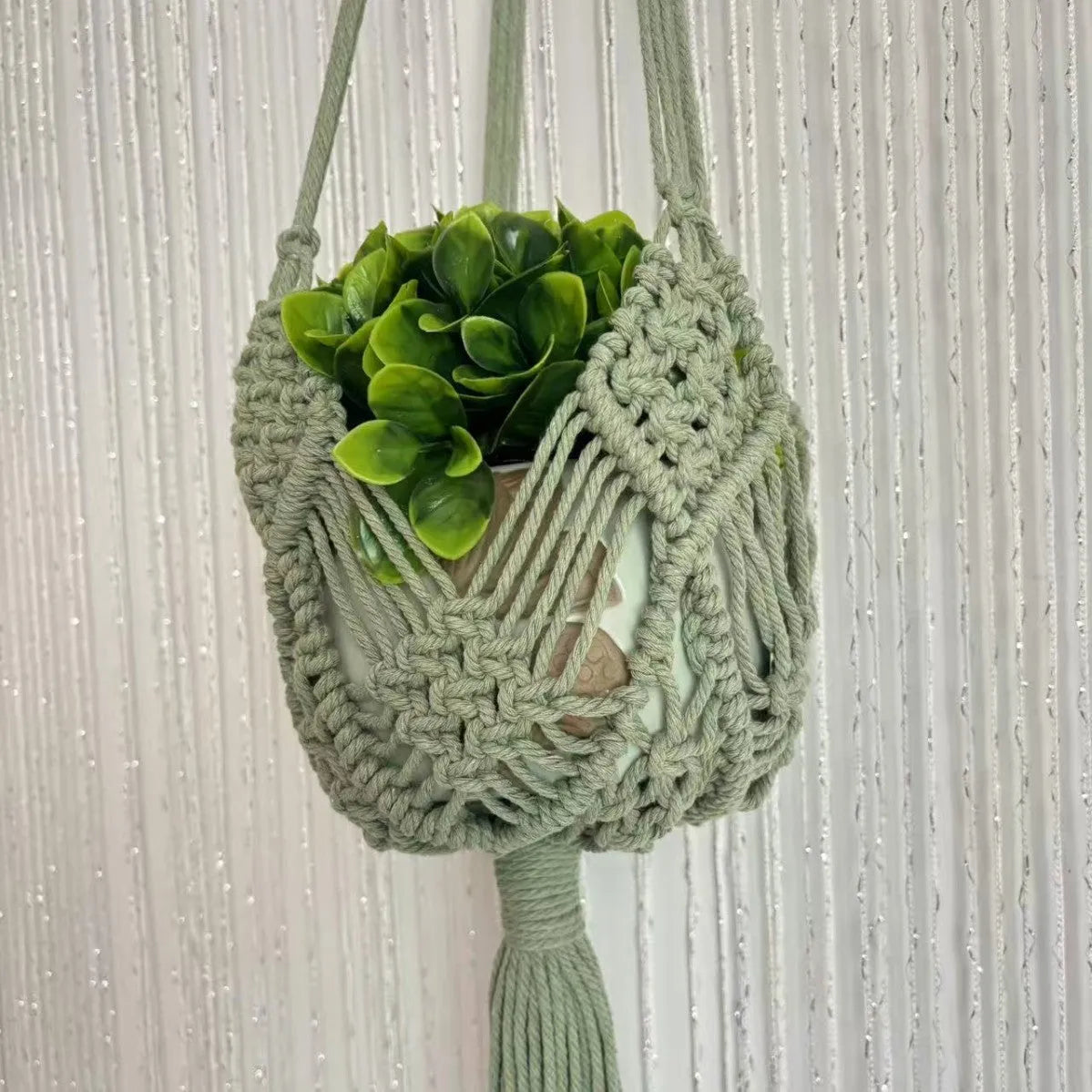 Hand-woven polyester cotton flower pot cover in brown colour with textured surface