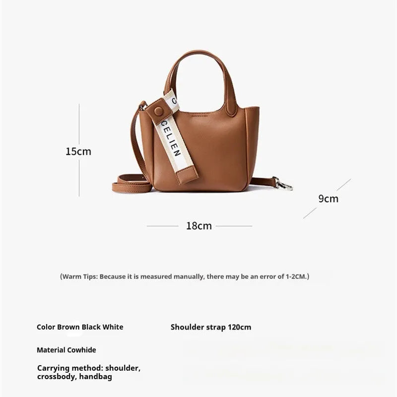 Genuine cattlehide leather cross body bucket bag in square vertical retro style.