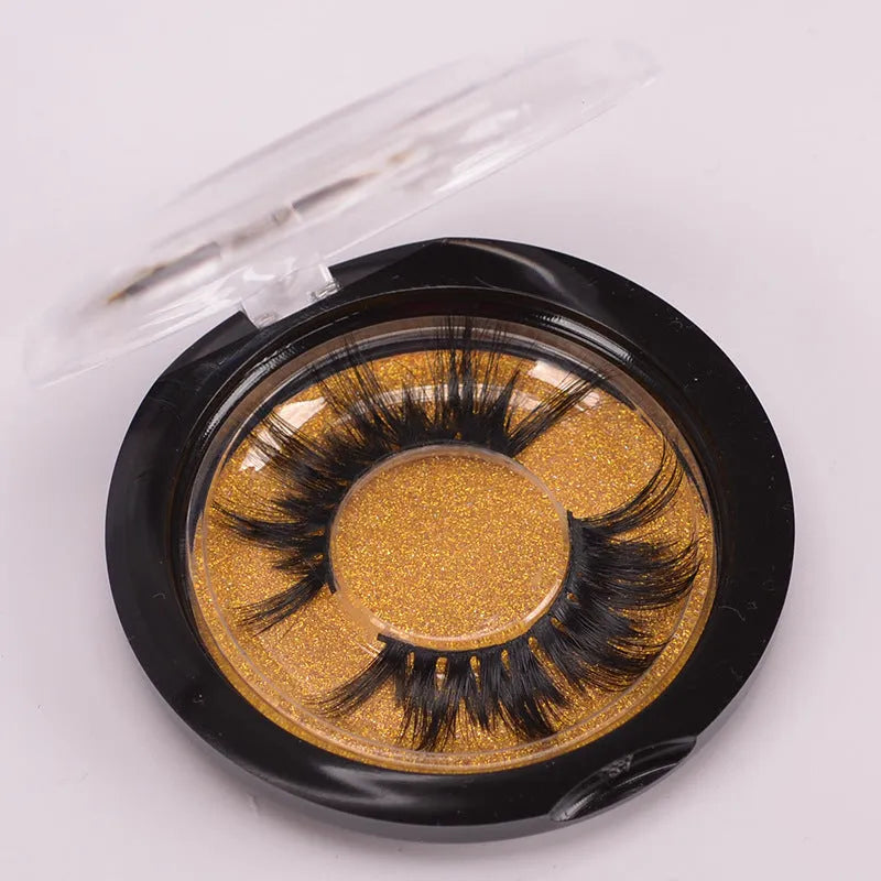 5D mink false eyelashes in natural black with double-headed brush and hair cap.