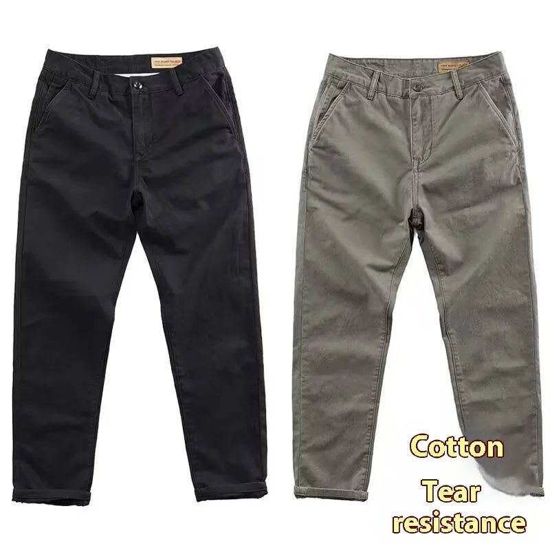 Men's slim fit casual trousers in grey with a straight leg design, made from a micro-elastic fabric blend.