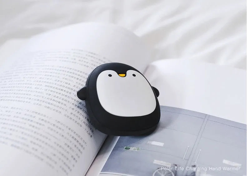 Cartoon penguin polar bear design USB rechargeable electric hand warmer power bank showing double-side heating