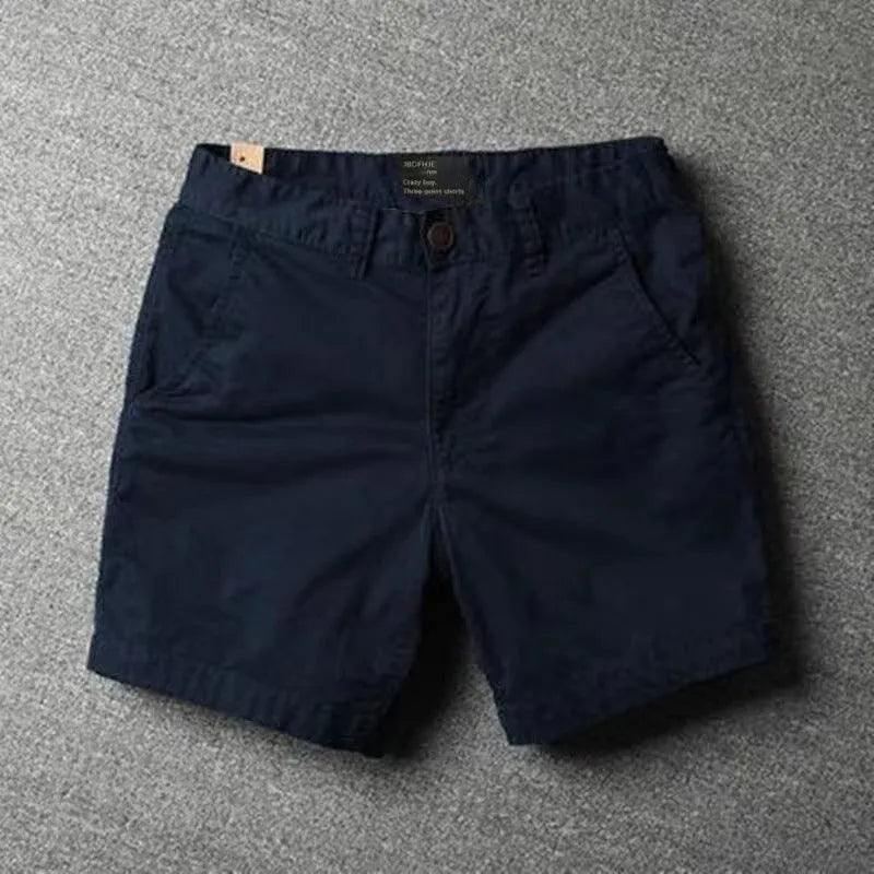 Men's cotton loose shorts in straight-leg cut with zipper fly, shown in multiple colour options including camouflage patterns