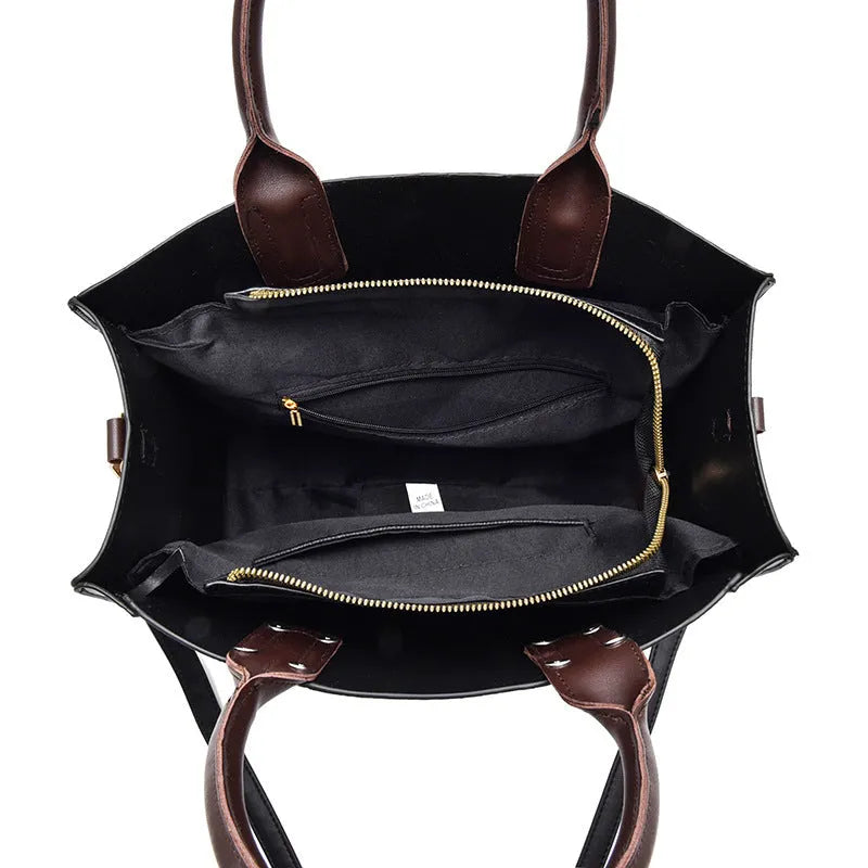 Ladies PU leather crossbody satchel bag with adjustable strap in black, horizontal square shape, soft finish