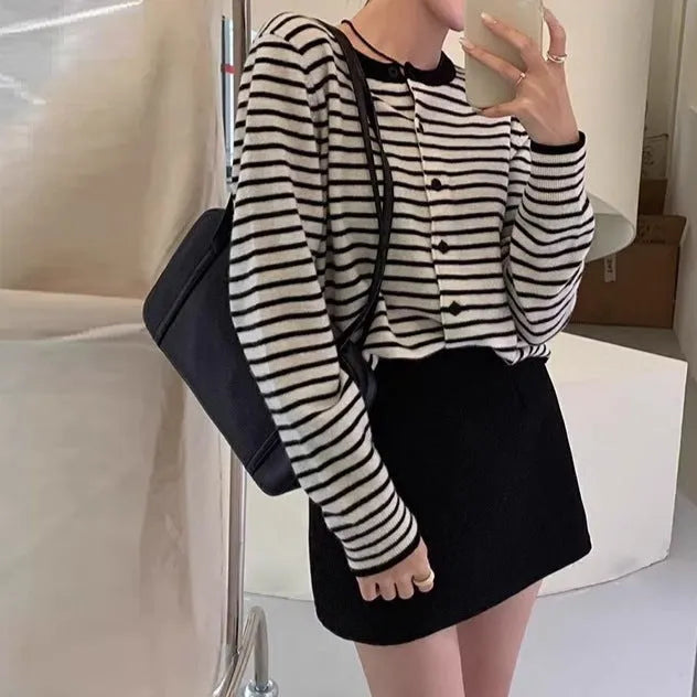Women's dark grey and white striped viscose cardigan sweater with long sleeves, shown as a slim-fit short-length top.