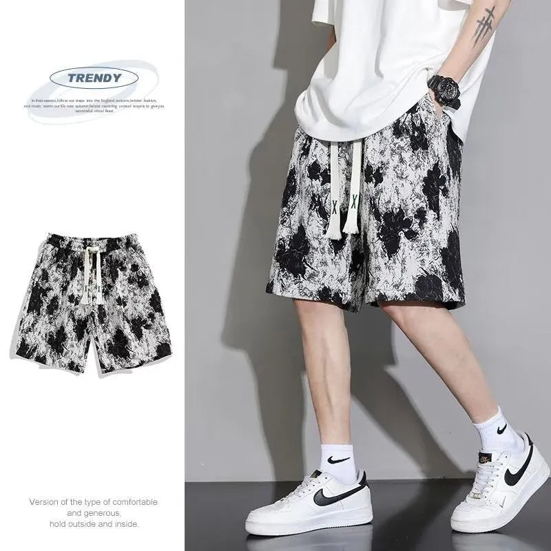 Men's lightweight polyester summer shorts in fifth-length cut showing colour options