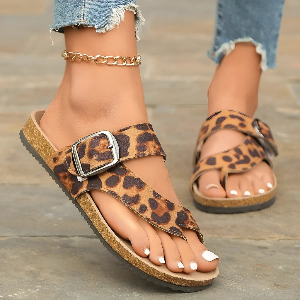 Roman style leopard print slippers with round toe covering and wooden sole
